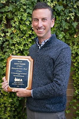 Jason Tanner with his IBEA award