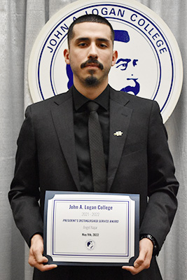 Angel Najar with President's Distinguished Service Award