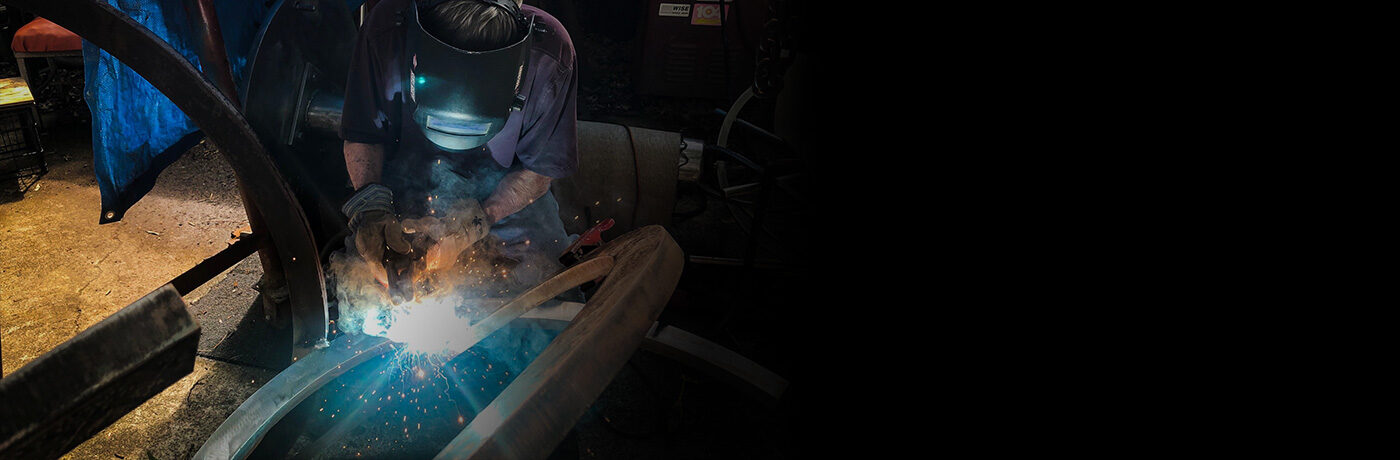 Aldon Addington working on sculpture