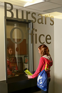 Student at Bursar's Office window