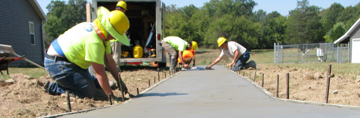 Students working on concrete