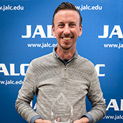 Jason Tanner with award for National Business Education Association Post Secondary Teacher of the Year