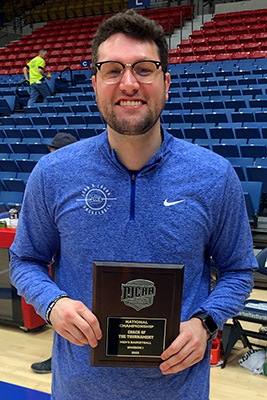 John A. Logan College Men’s Basketball Coach Tyler Smithpeters with NJCAA National Coach of the Year award