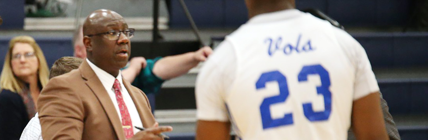 Charlie Jones coaching on the basketball court