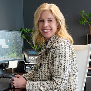 Dr. Stephanie Chaney Hartford sitting at desk