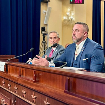 Chris Maynor speaking to the House Veterans Affairs Committee