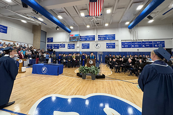 Provost Stephanie Hartford addresses crowd at 2025 Commencement ceremony.