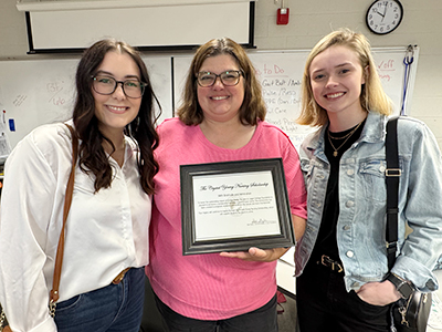 Crystal Young (Center) with former students Georgia Stroud and Hannah Hooks