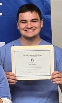 Toby Hollister with Certified Nursing Assistant certificate.