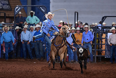 Leo Loucks roping in rodeo competition.