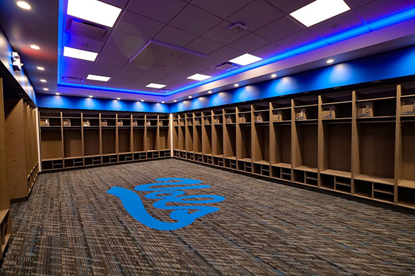 Interior the Harrison-Bruce Player Development Center with areas for players to store their equipment.