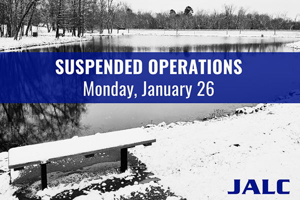 Mary Logan pond with snow around it with text reading SUSPENDED OPERATIONS Monday, January 26 and JALC lettering.