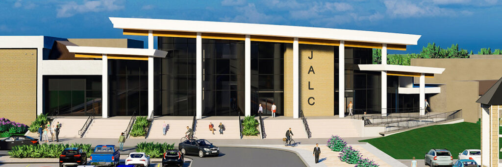 Rendering of the outside of the West Entrance for John A. Logan College. Entrance has large windows with stairs and ramp in front.