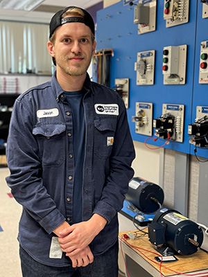 Jason Ralston standing wearing an Intertape Polymer Group shirt.