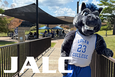 JALC mascot Charger leaning on bridge railing at John A. Logan College with JALC lettering overlaying the image.